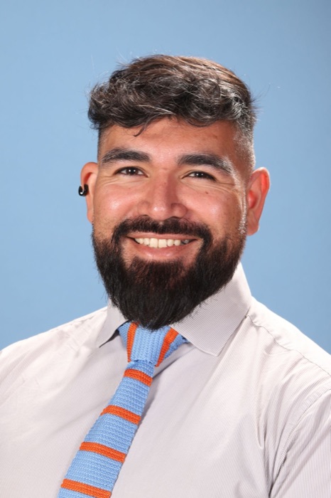 Portrait of Mr. Zenteno smiling